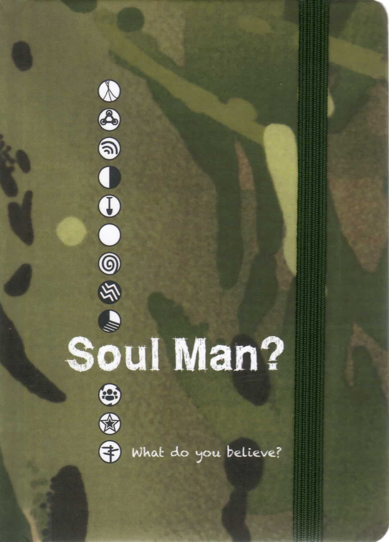 The Soul Man? notebook cover displays a camouflage pattern with icons in a vertical row, the text "Soul Man?" in white, "What do you believe?" below in smaller letters, and features a vertical elastic strap on the right.
